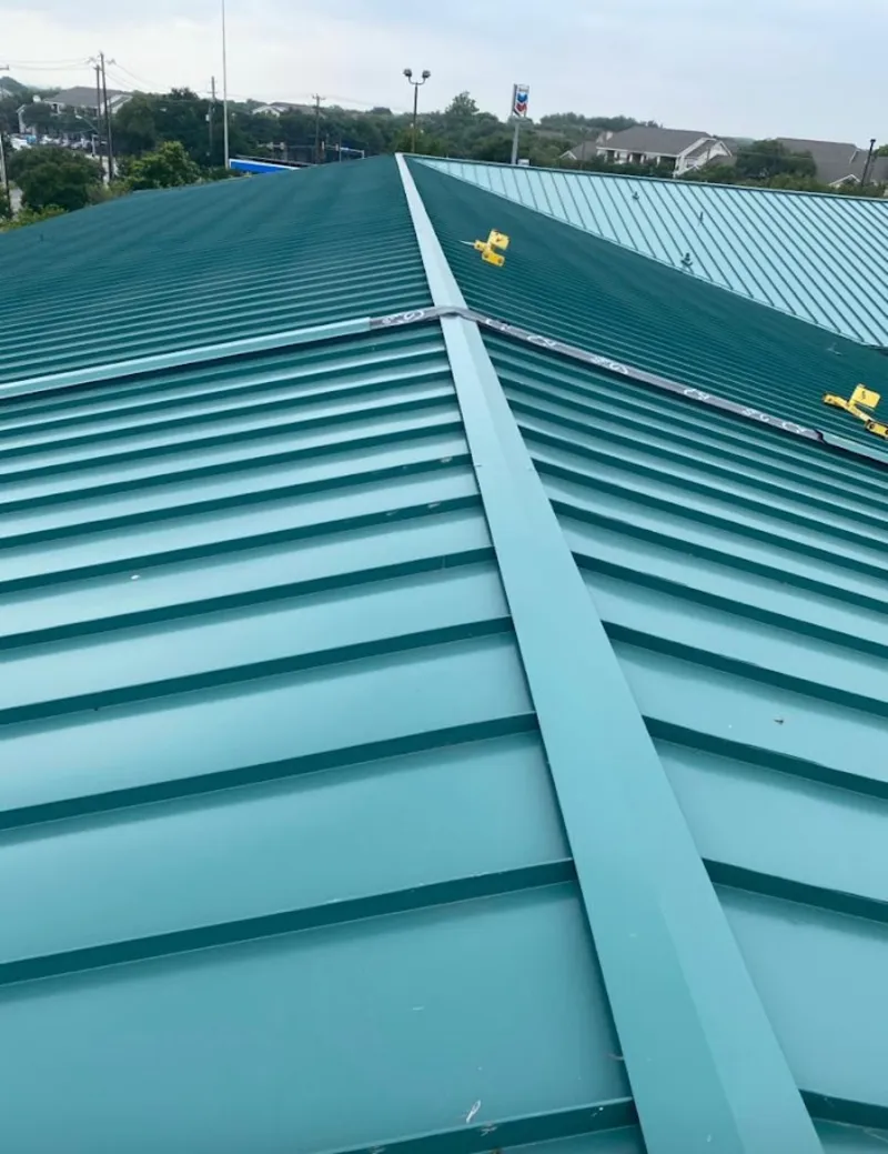 Green commercial metal roof ridge and valley for Metal Roof Repair in Volo